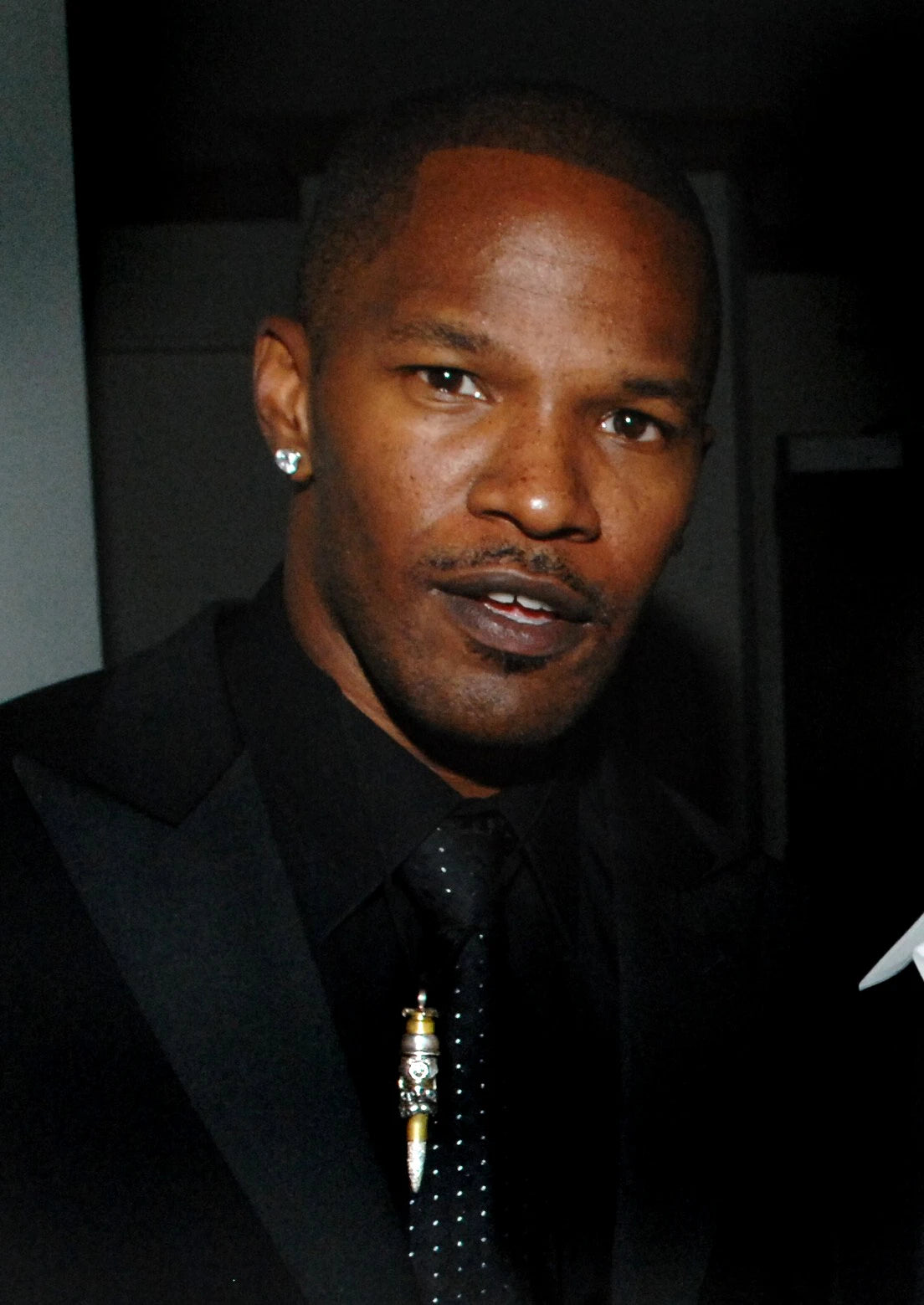 Jamie Foxx with a Bullets 4 Peace pendant, original brand archive photograph