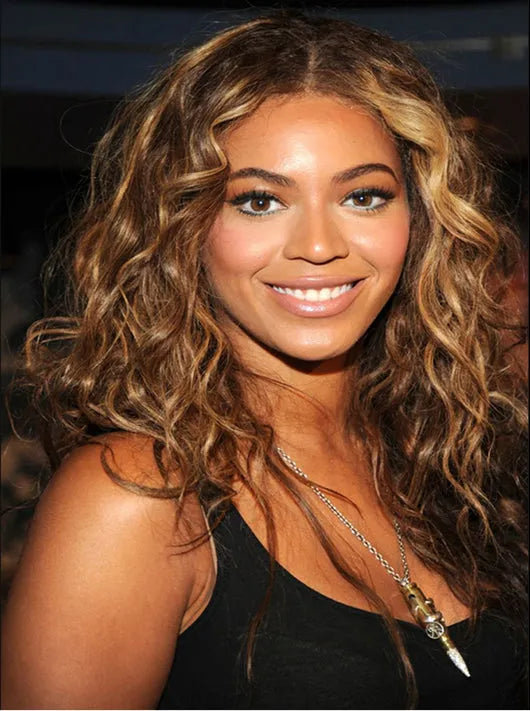 Beyoncé wearing a Bullets 4 Peace pendant, original brand archive photograph